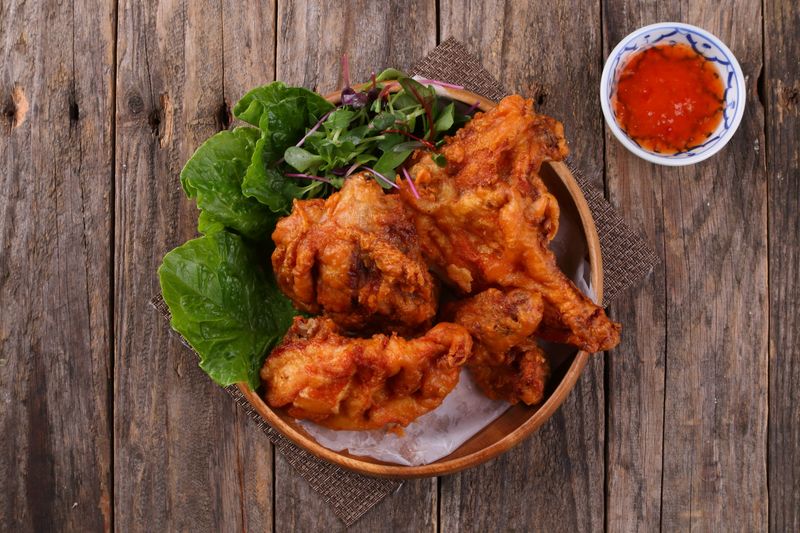Hangry Joe's signature hot chicken sandwich served golden and crispy