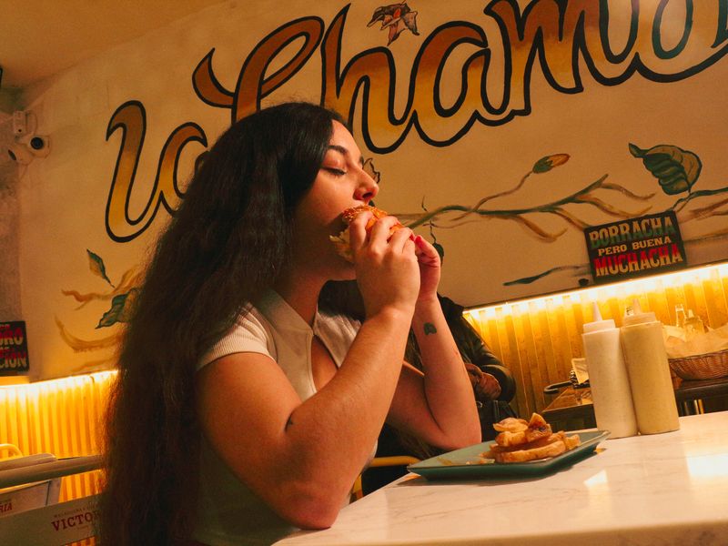 Hangry Joe's dedicated kitchen team preparing fresh hot chicken dishes